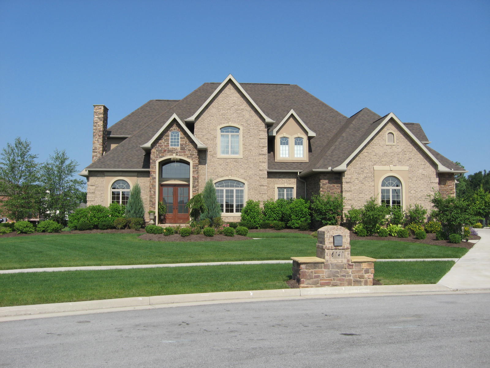 makow-associates-urban-villa-front-elevation-french-chateau-homes